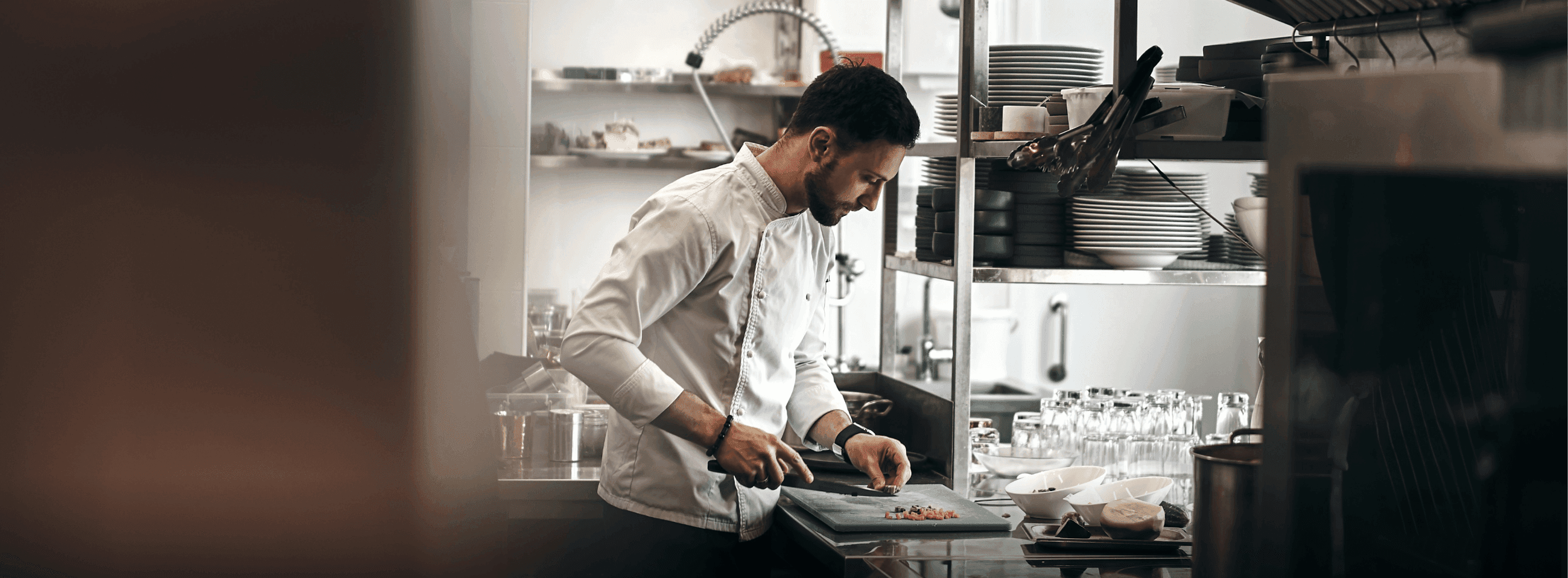 Hospitality research — chef in a professional kitchen